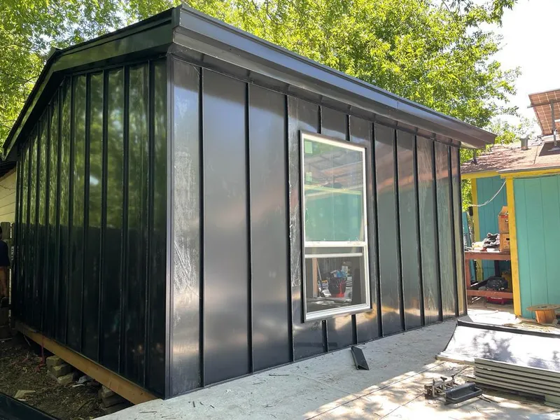 Black standing seam metal wall panels for Roof Inspection in Sturgis