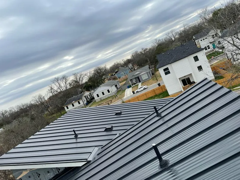 Standing seam metal roof panels with vents for Skylight Repair in Sturgis